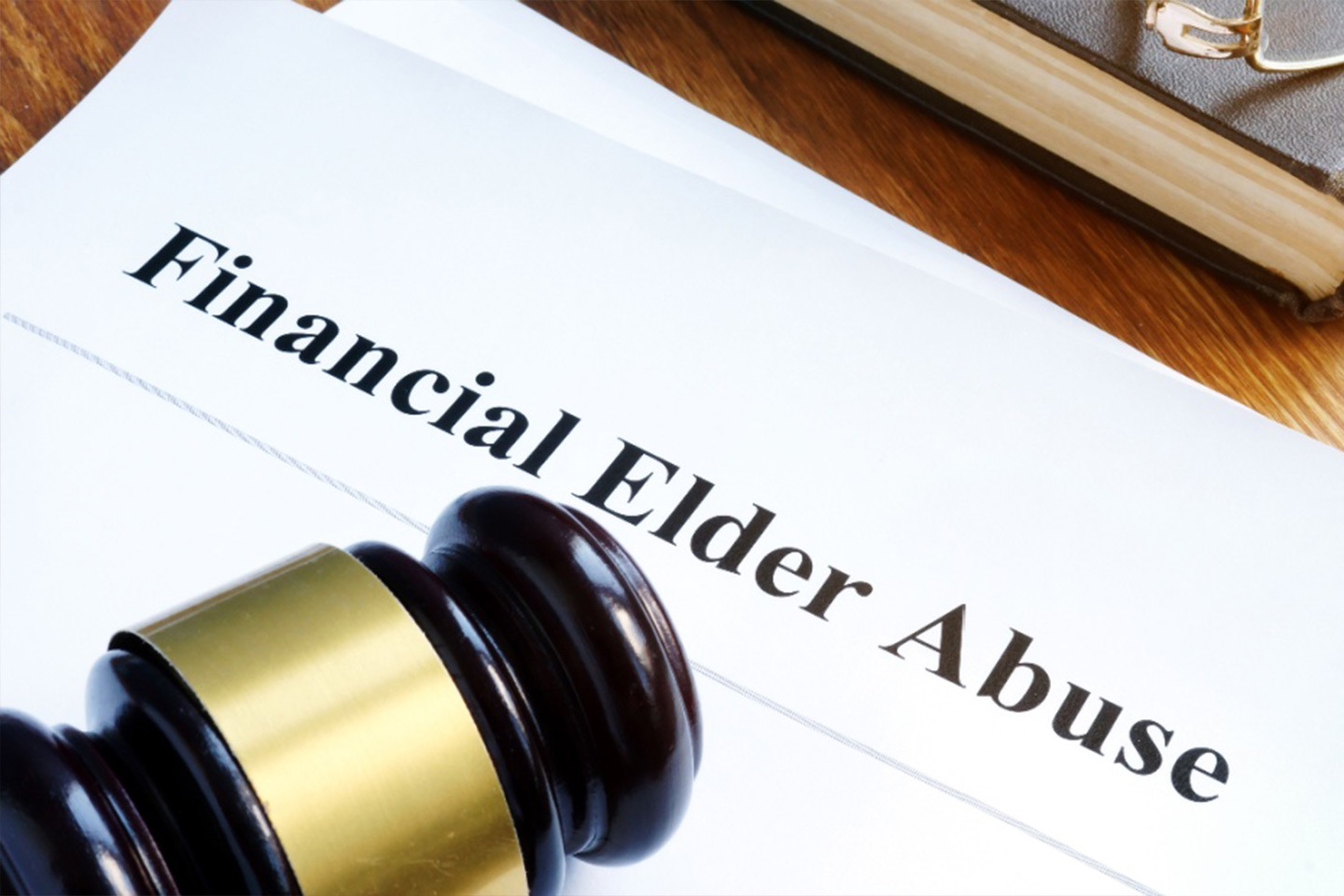 Photo of a document with a judge's gavel on top