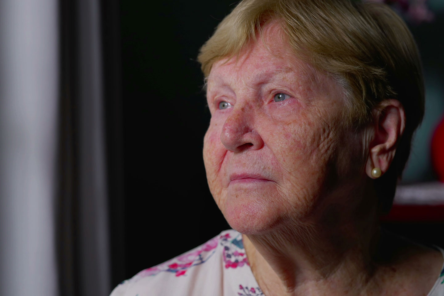 Photo of woman with a pearl earring