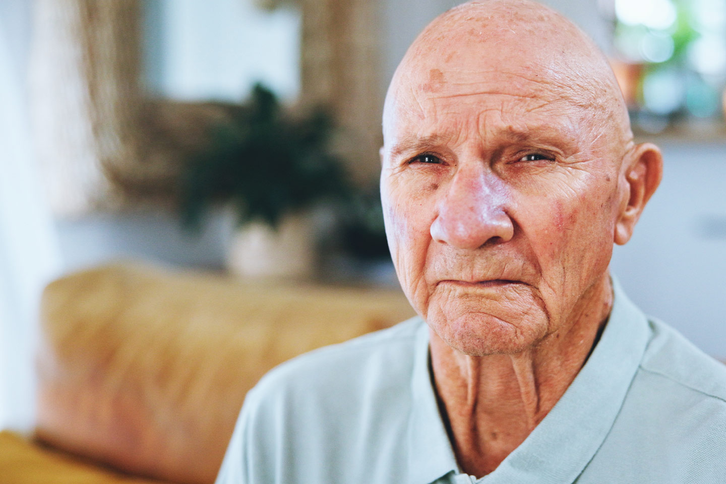 Photo of man wearing a pale blue shirt
