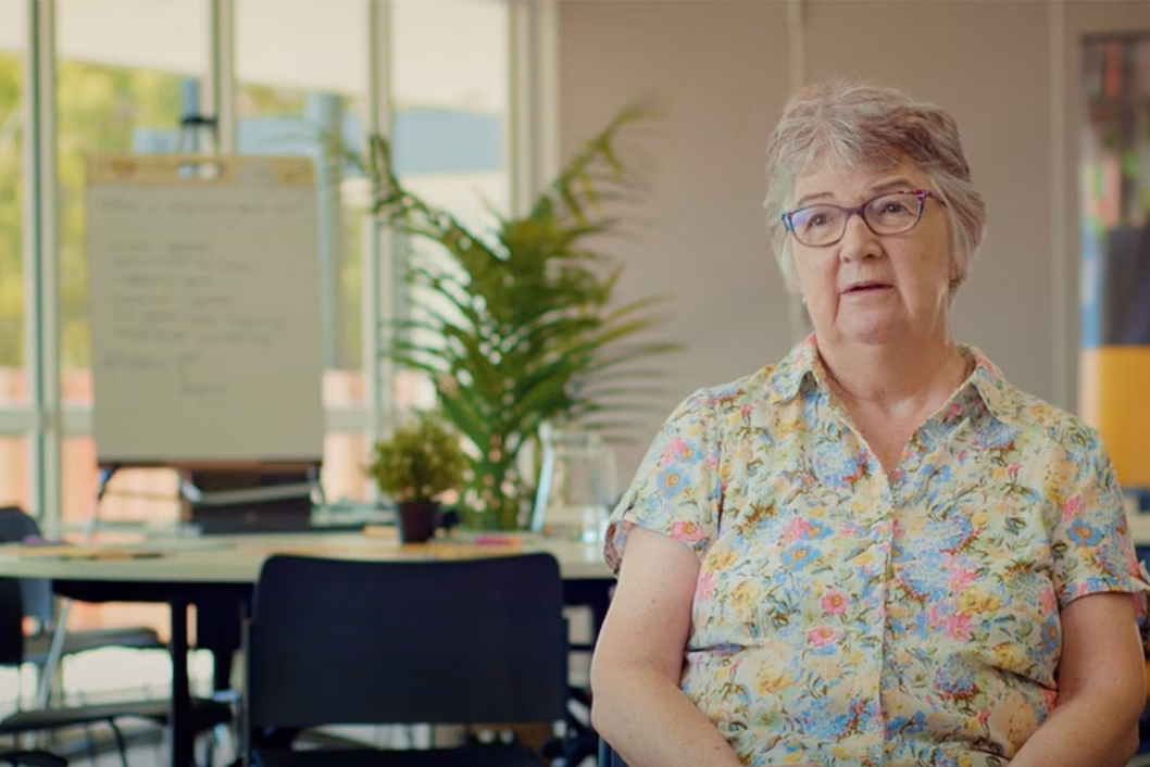 Photo of a woman in a meeting room
