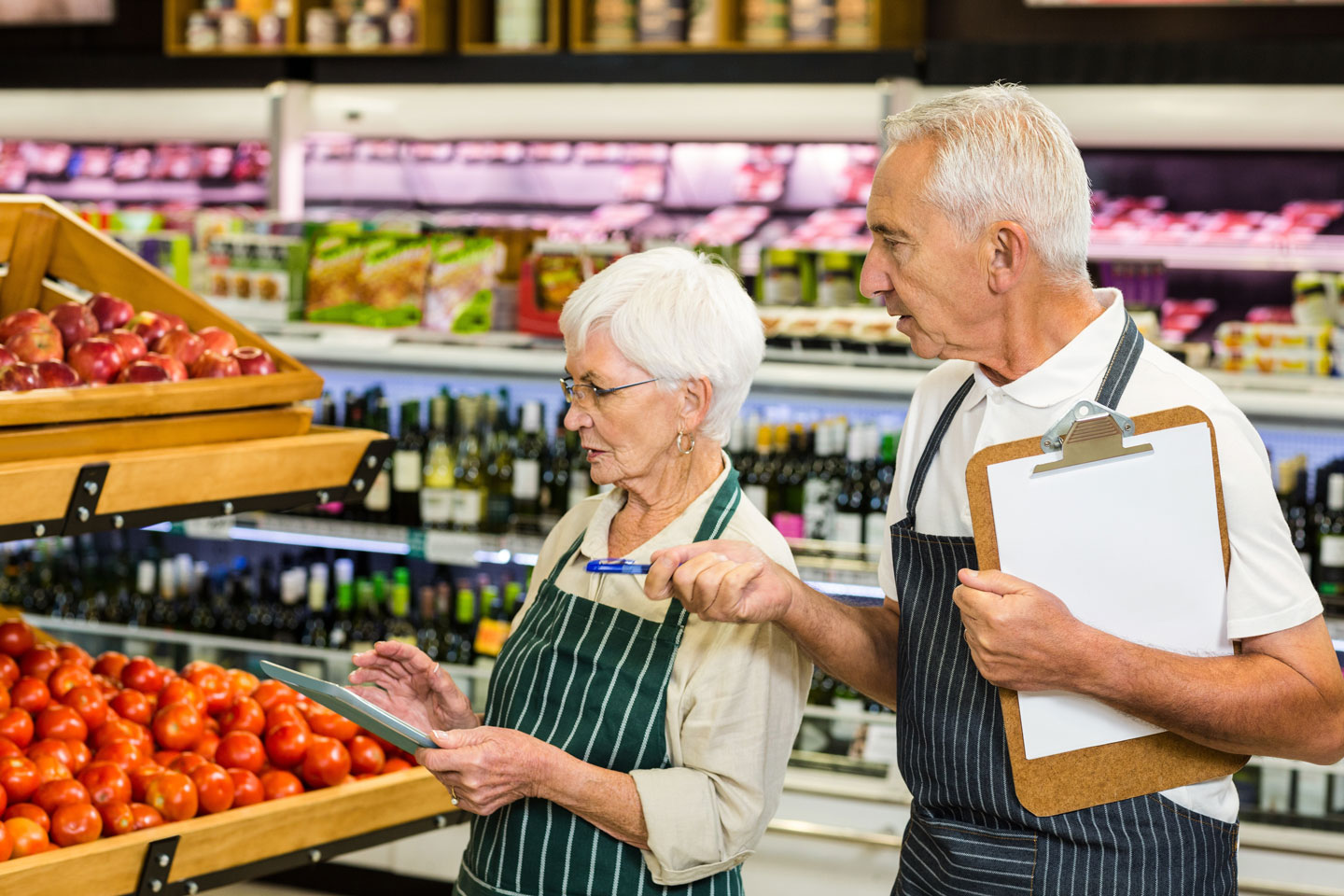 Seniors working in a grocery store