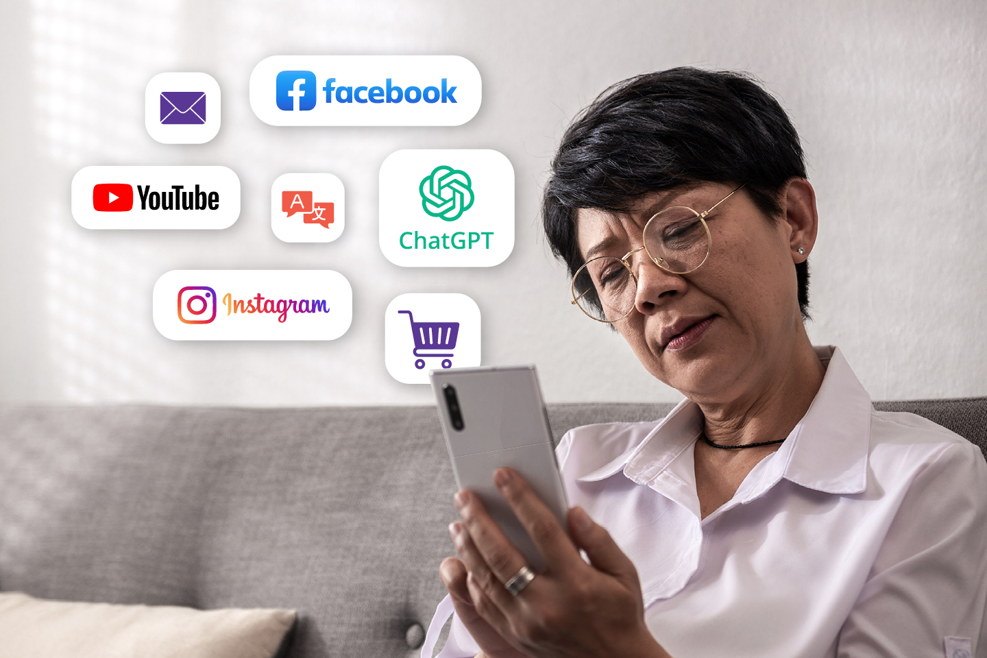 Im age of an older Asian woman on a smartphone with the following icons in the background: email, Facebook, YouTube, Instagram, Chat GST and a shopping cart