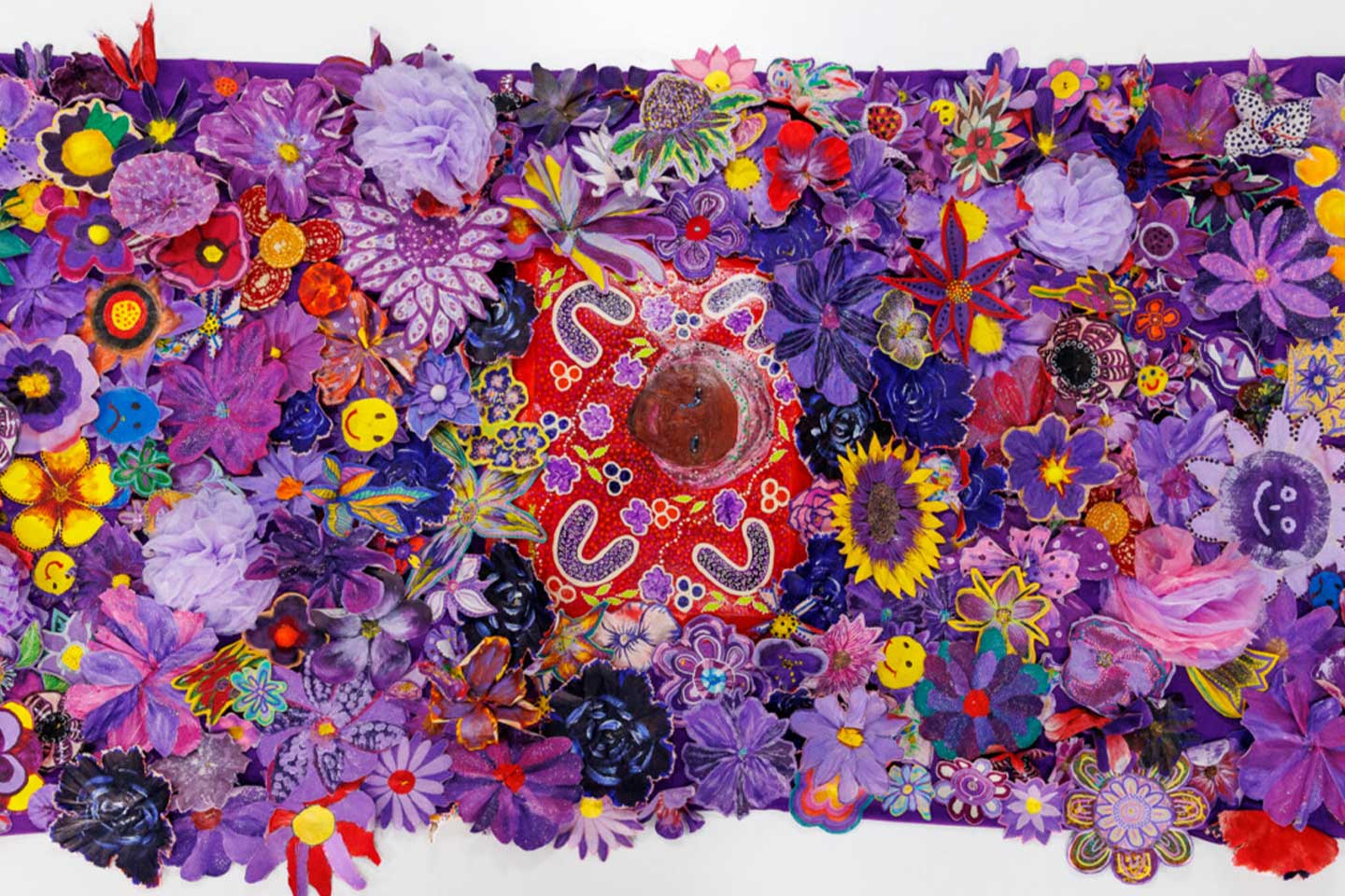 Photo of beautiful purple woven flowers forming a rug