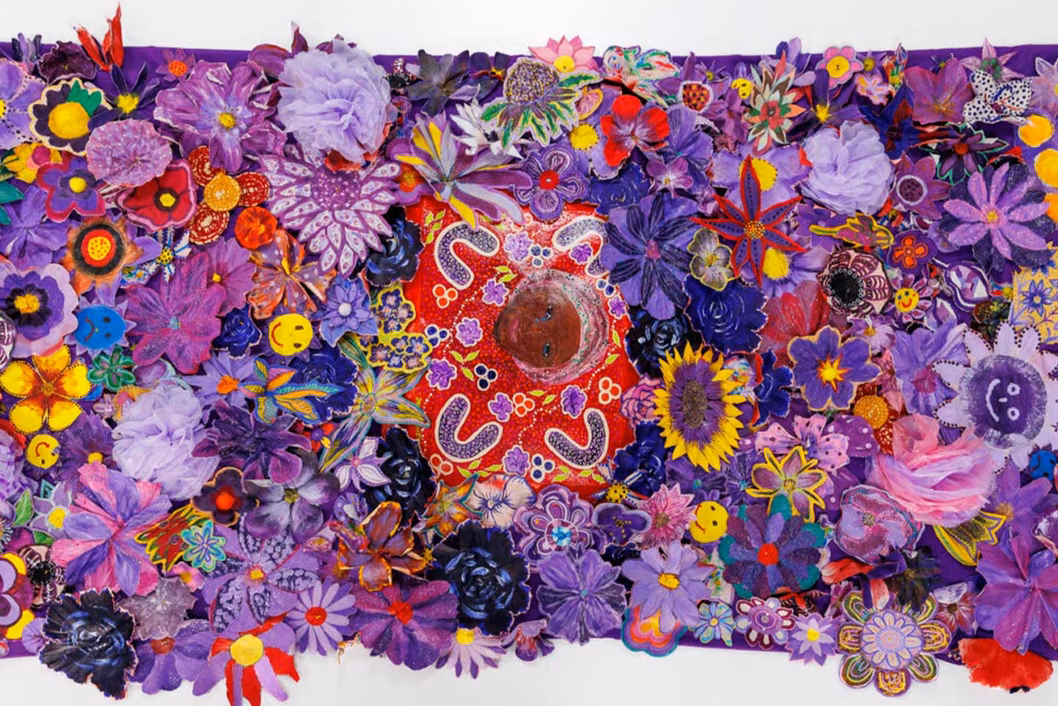 Photo of beautiful purple woven flowers forming a rug