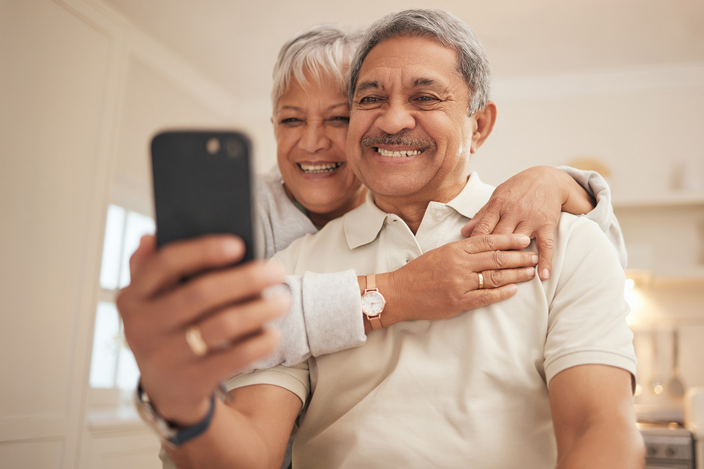 Photo of two people taking a selfie