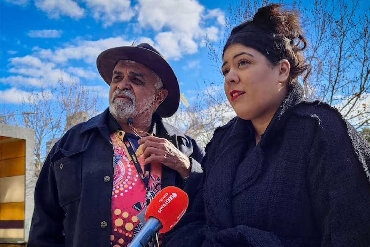 Photo of two indigenous people being interviewed