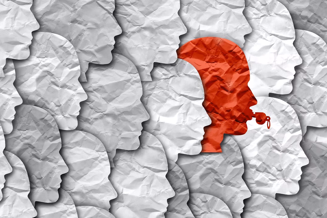 Graphic of red whistleblower in a group of grey non-whistle blowers