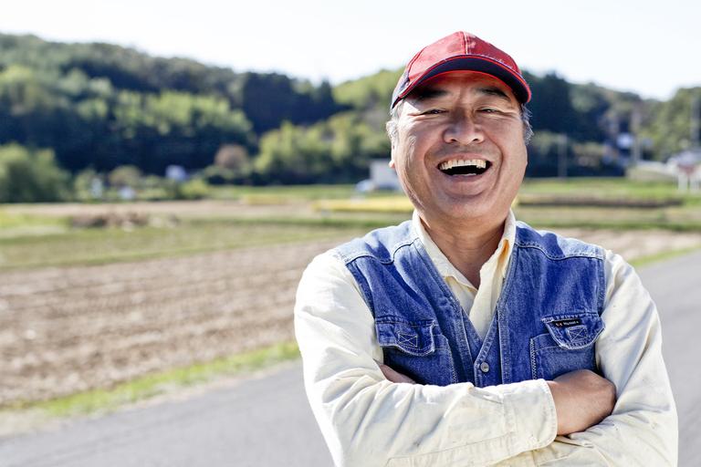 Image of a smiling older Asian man