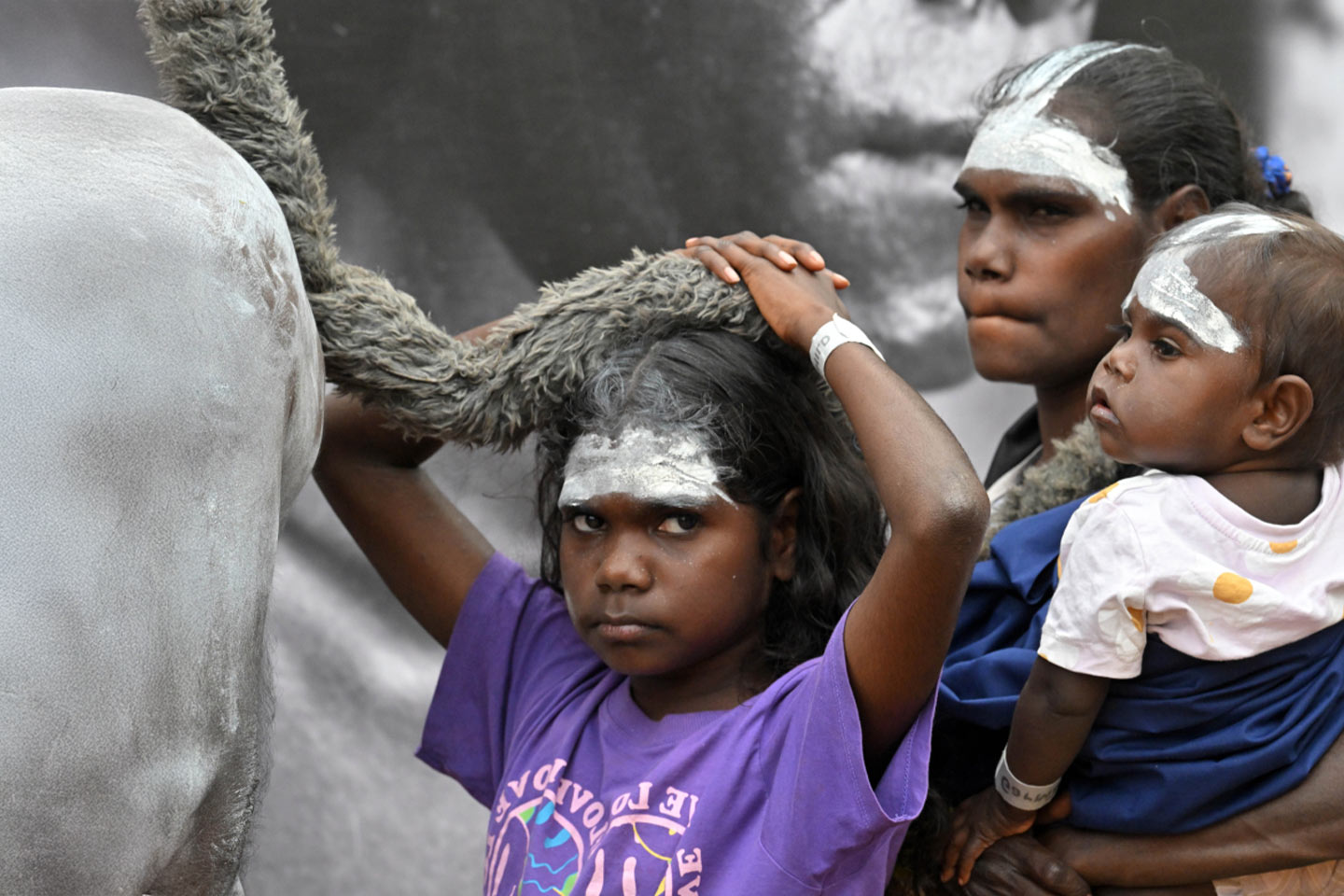 Photo of indigenous child, woman, and baby