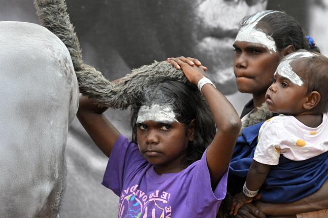 Photo of indigenous child, woman, and baby