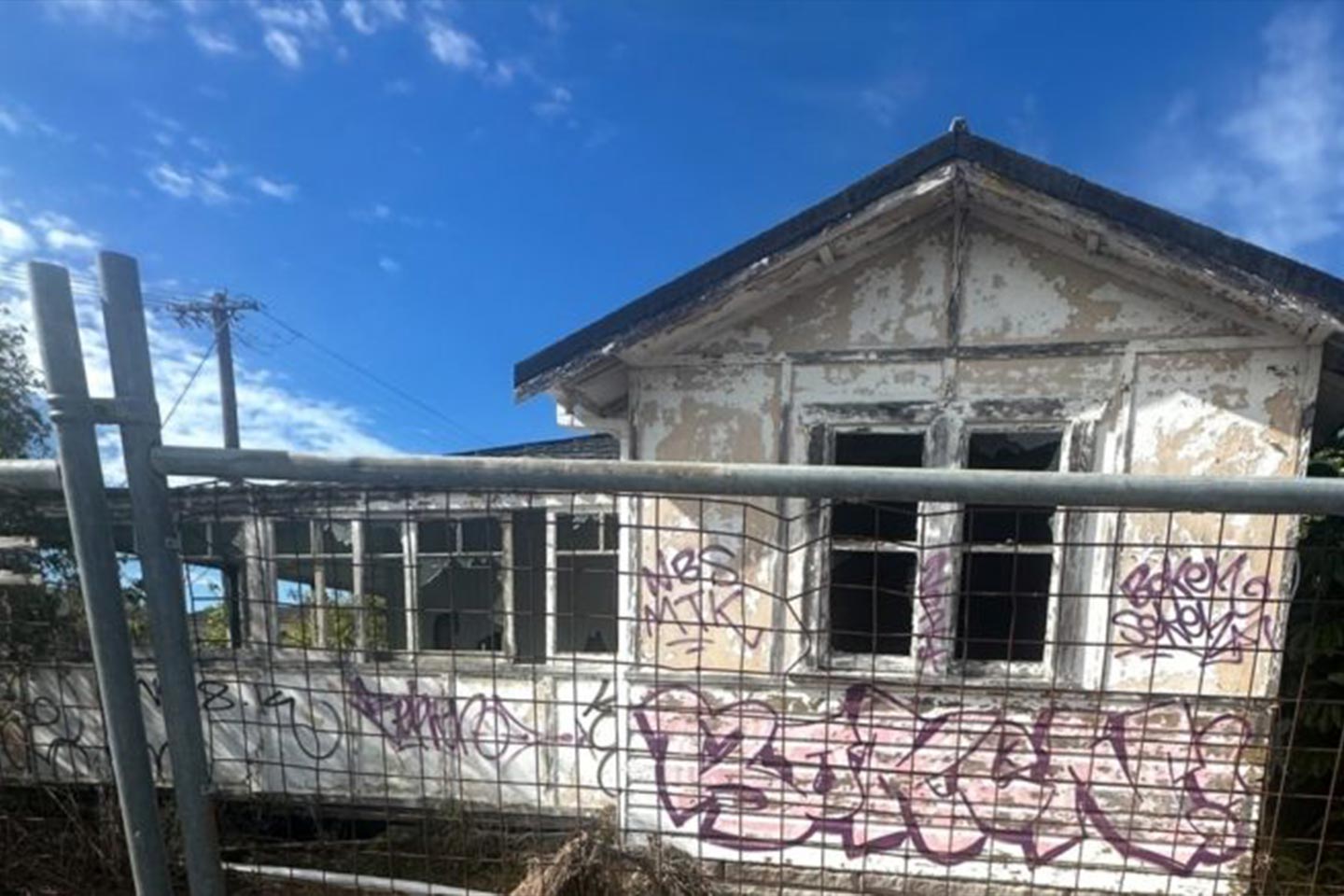 Photo of a vandalised abandoned house