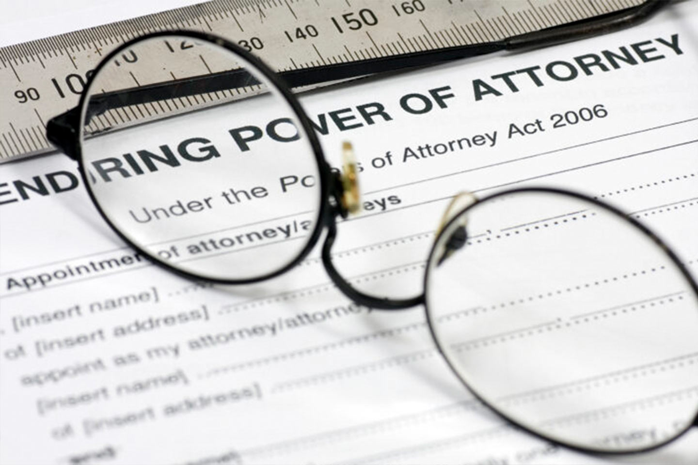 Photo of glasses sitting on documents