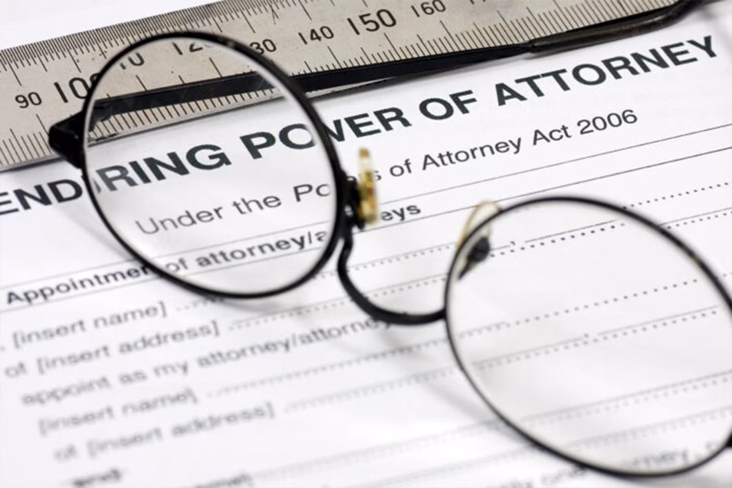 Photo of glasses sitting on documents