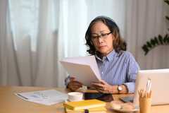 Senior woman at desk 