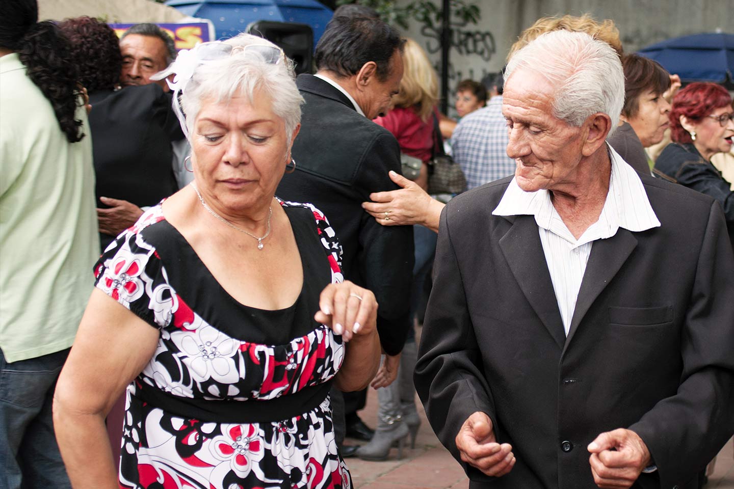 Photo of two seniors taking their dancing seriously