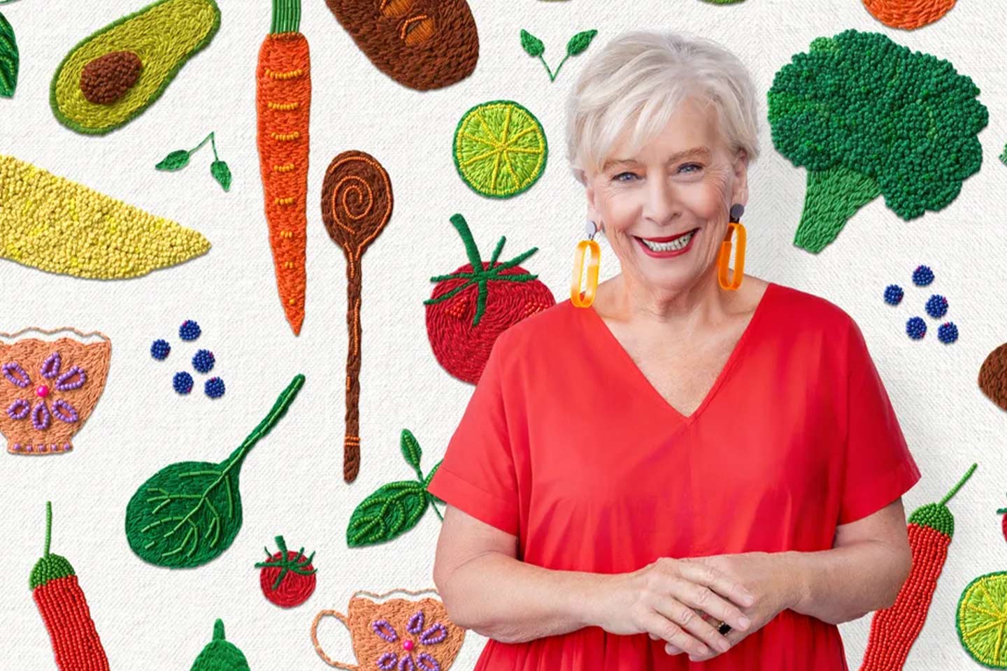 Photo of Maggie Beer wearing a bright red dress