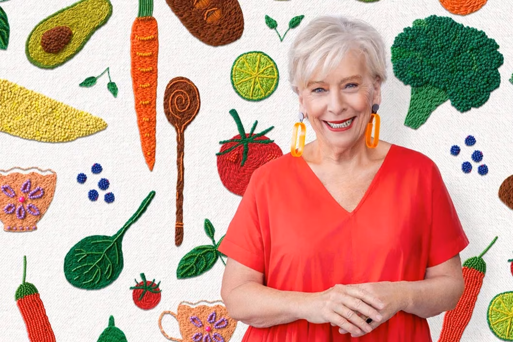 Photo of Maggie Beer wearing a bright red dress
