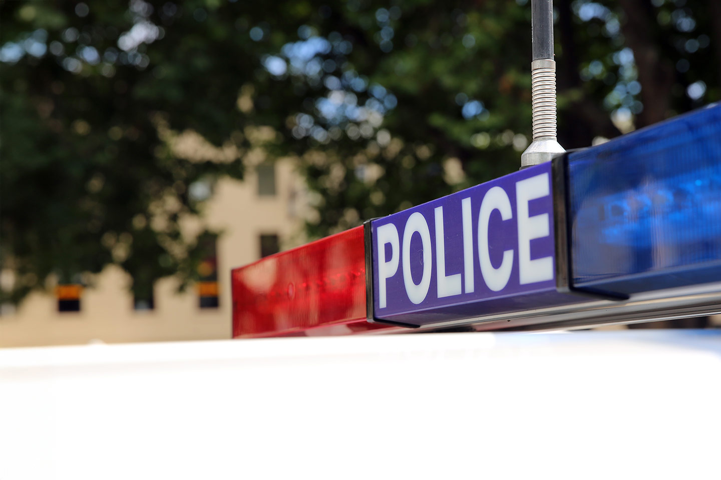 Photo of police lights on top of a police car