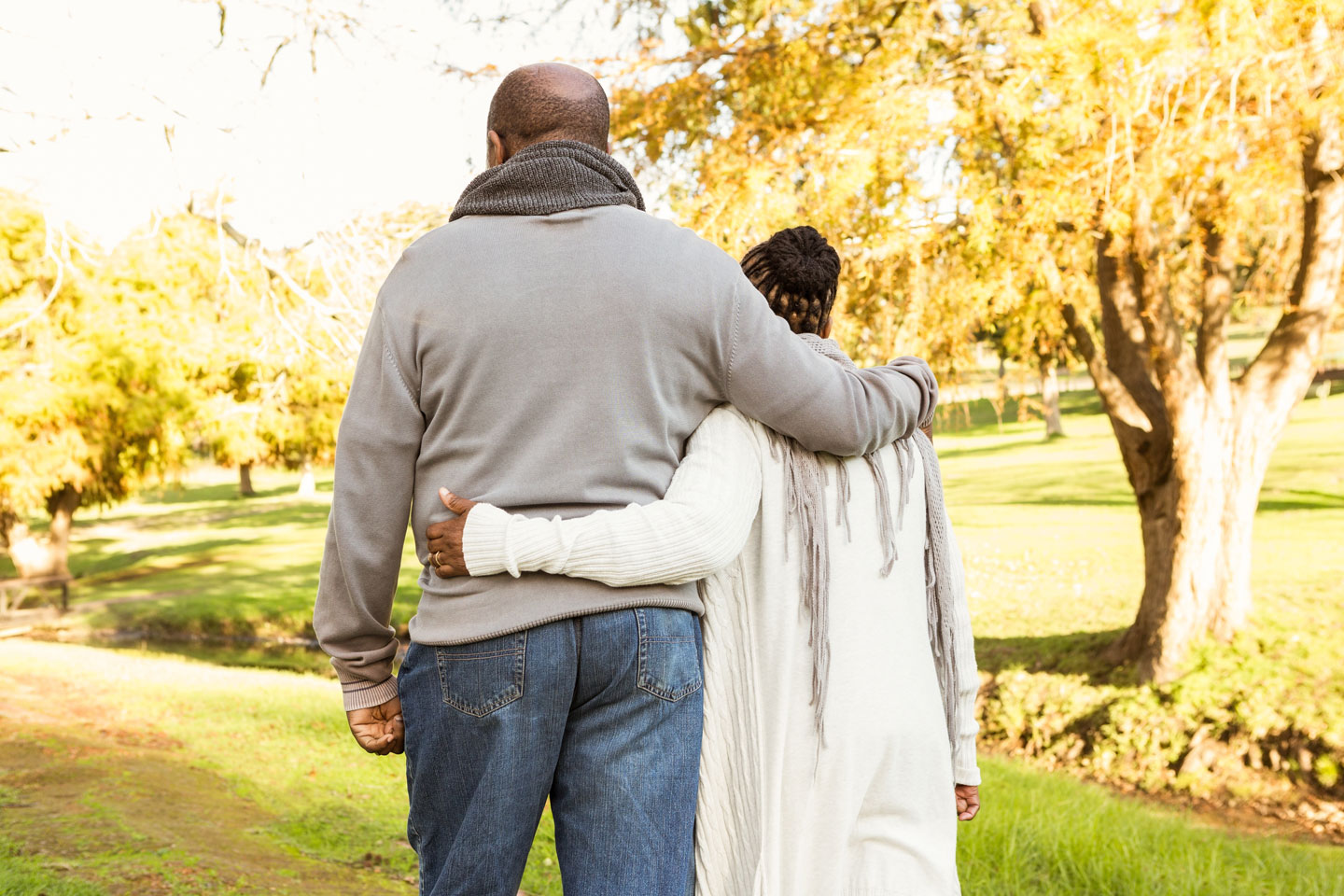 Senior couple walking in the park 