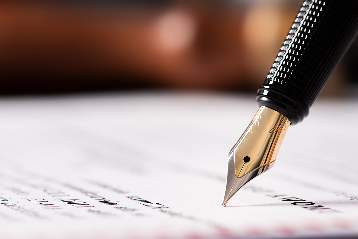 Photo of a fountain pen nib on paper