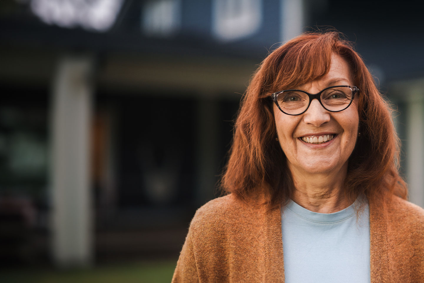 Image of an older woman with copper coloured hair