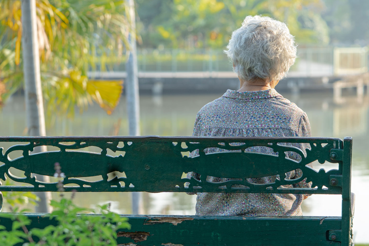 Senior woman sitting on a bench