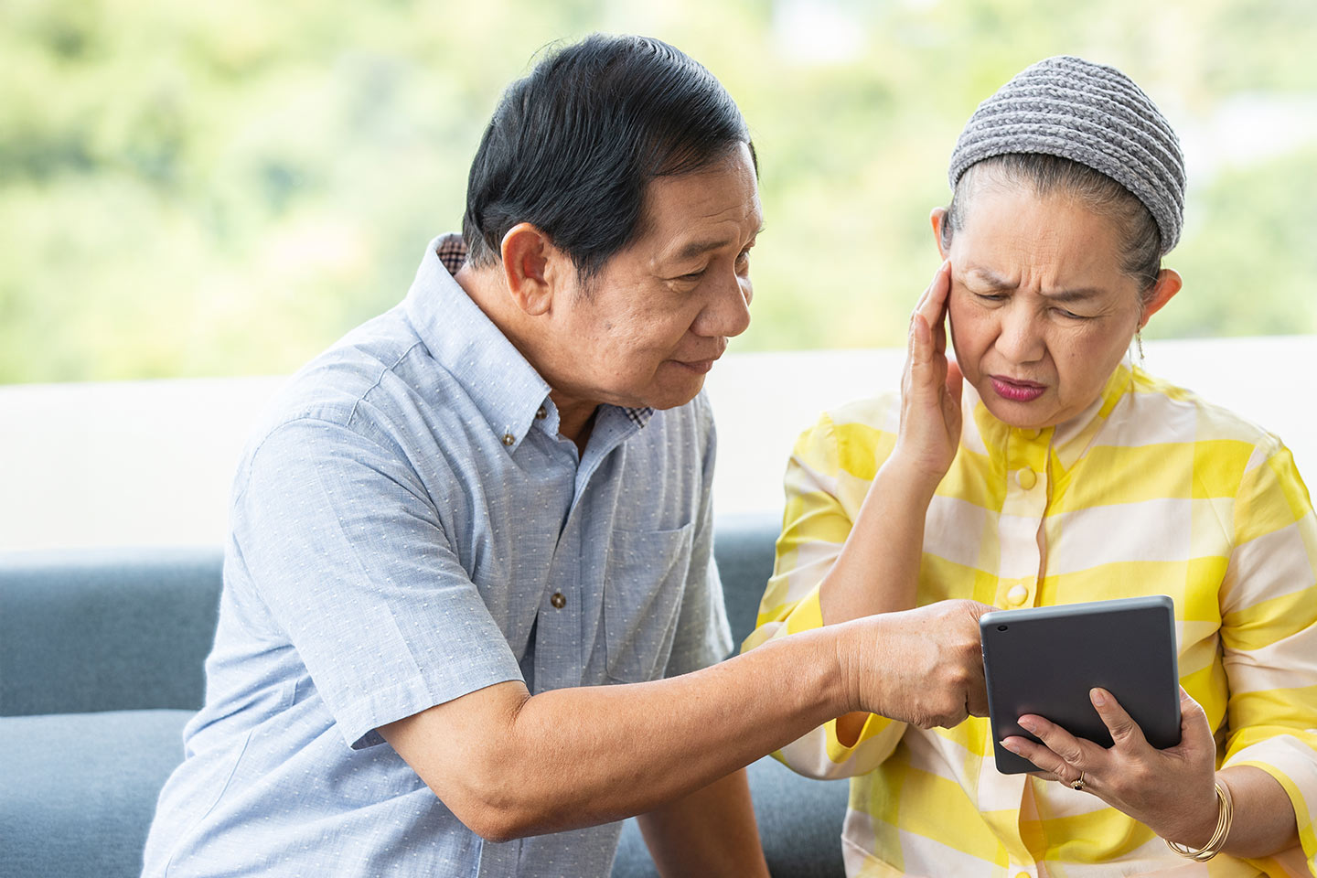 Image of an older Asian man and woman