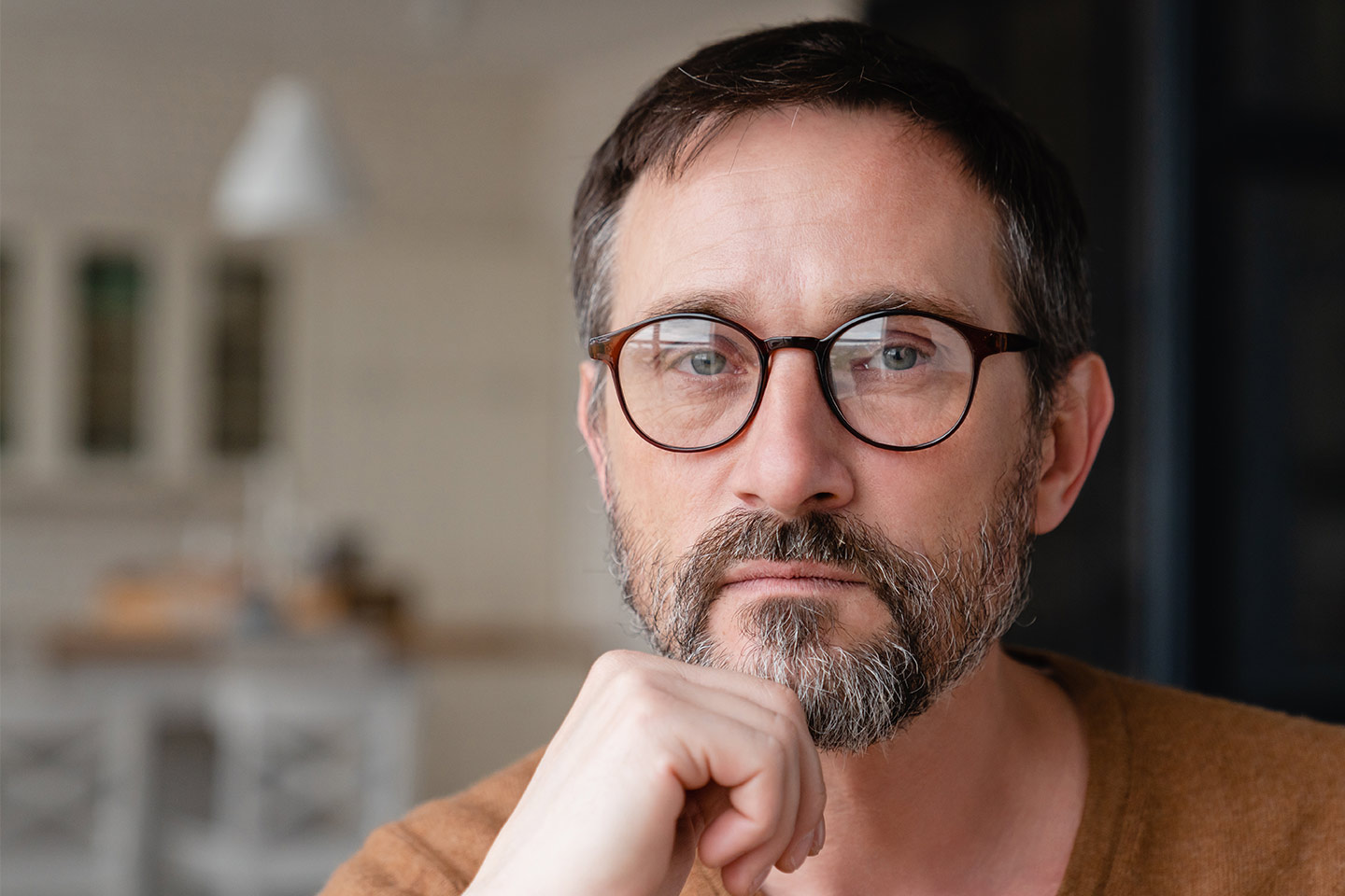 Image of an older man wearing glasses