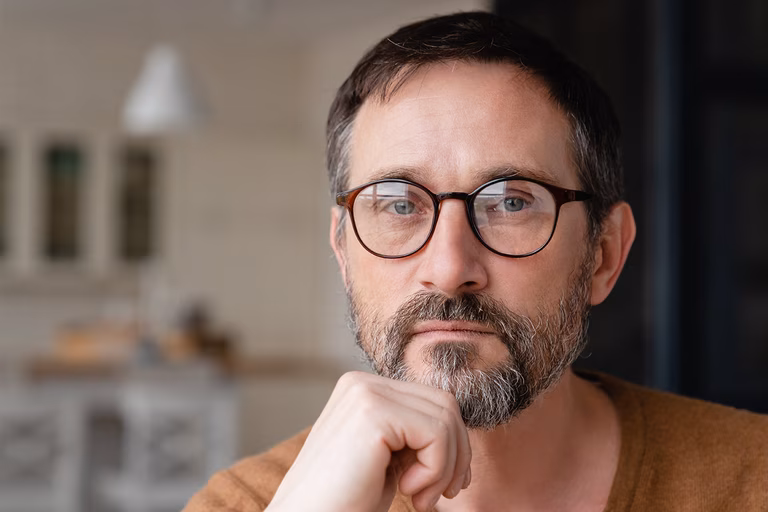 Image of an older man wearing glasses