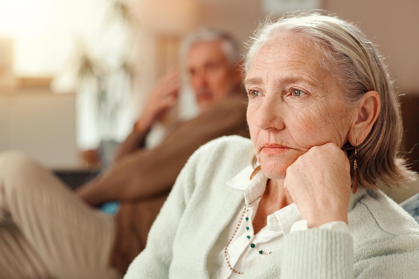 Photo of a woman resting her chin on her hand