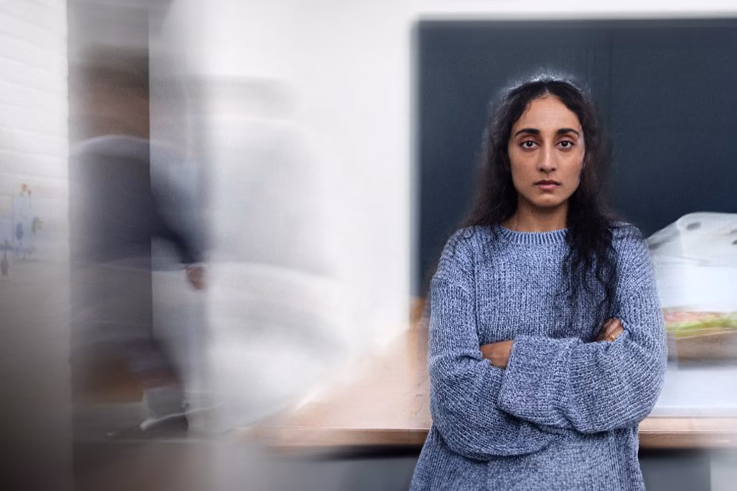 Photo of woman looking serious with arms crossed