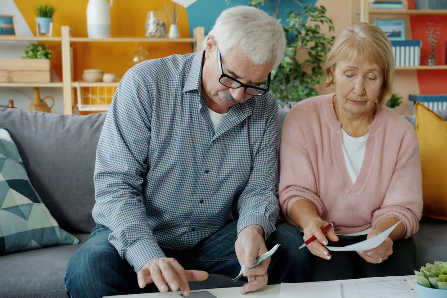 Photo of a man and a woman going through paperwork together