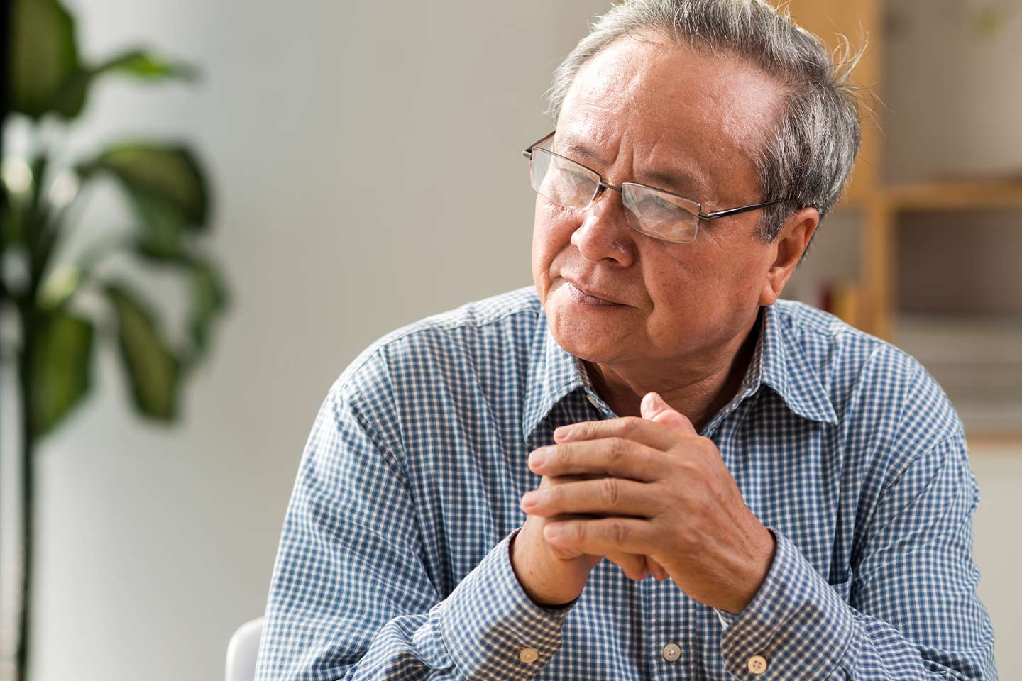 Photo of senior man looking pensive