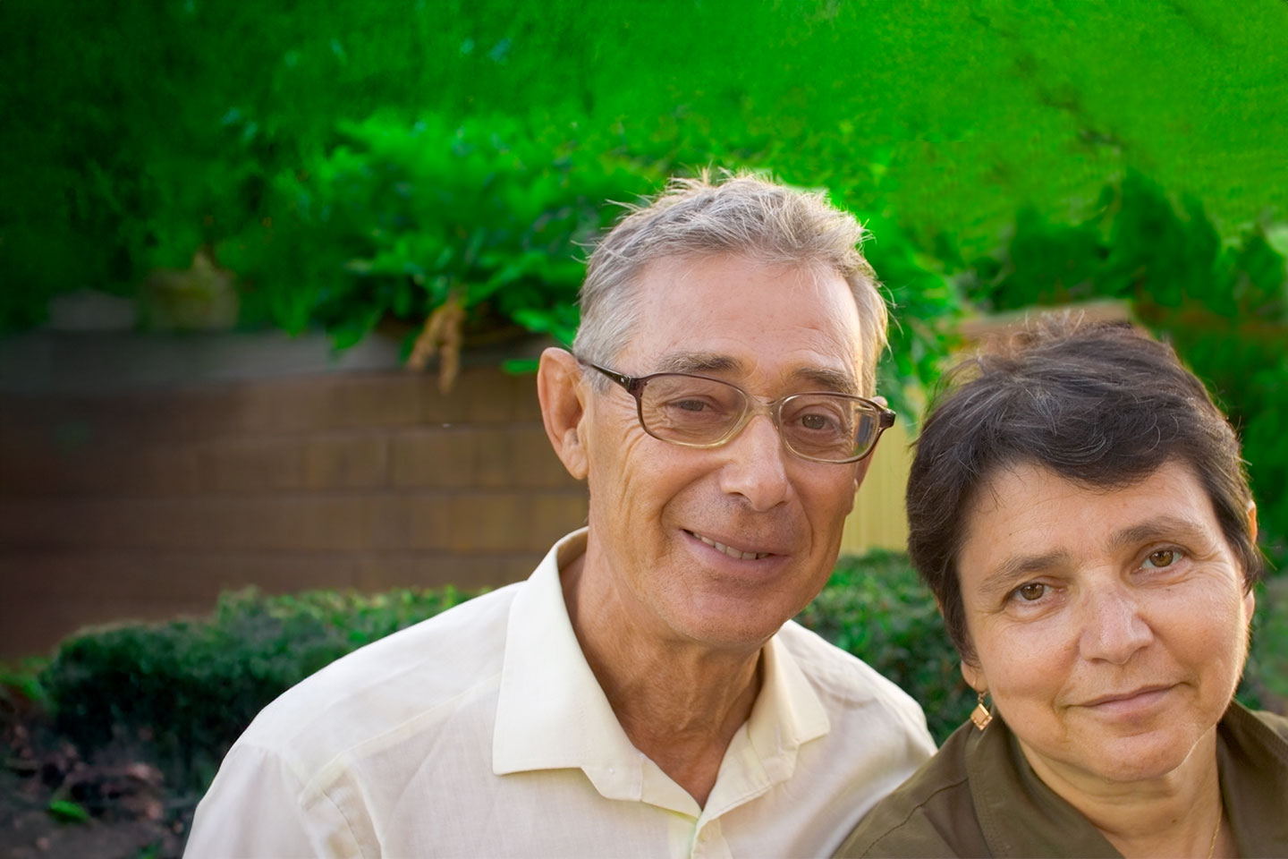 Image of a man and woman in their front yard