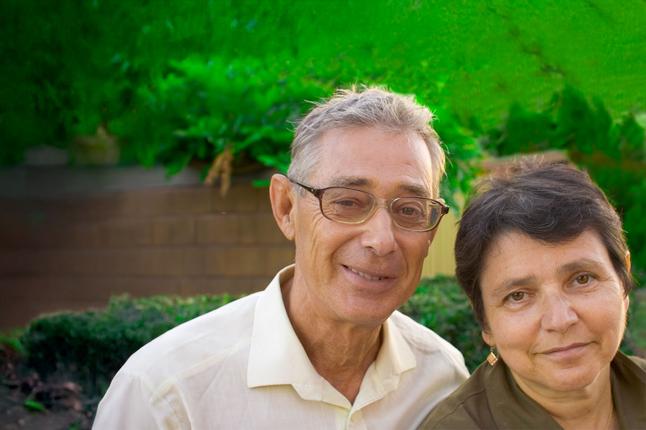 Image of a man and woman in their front yard