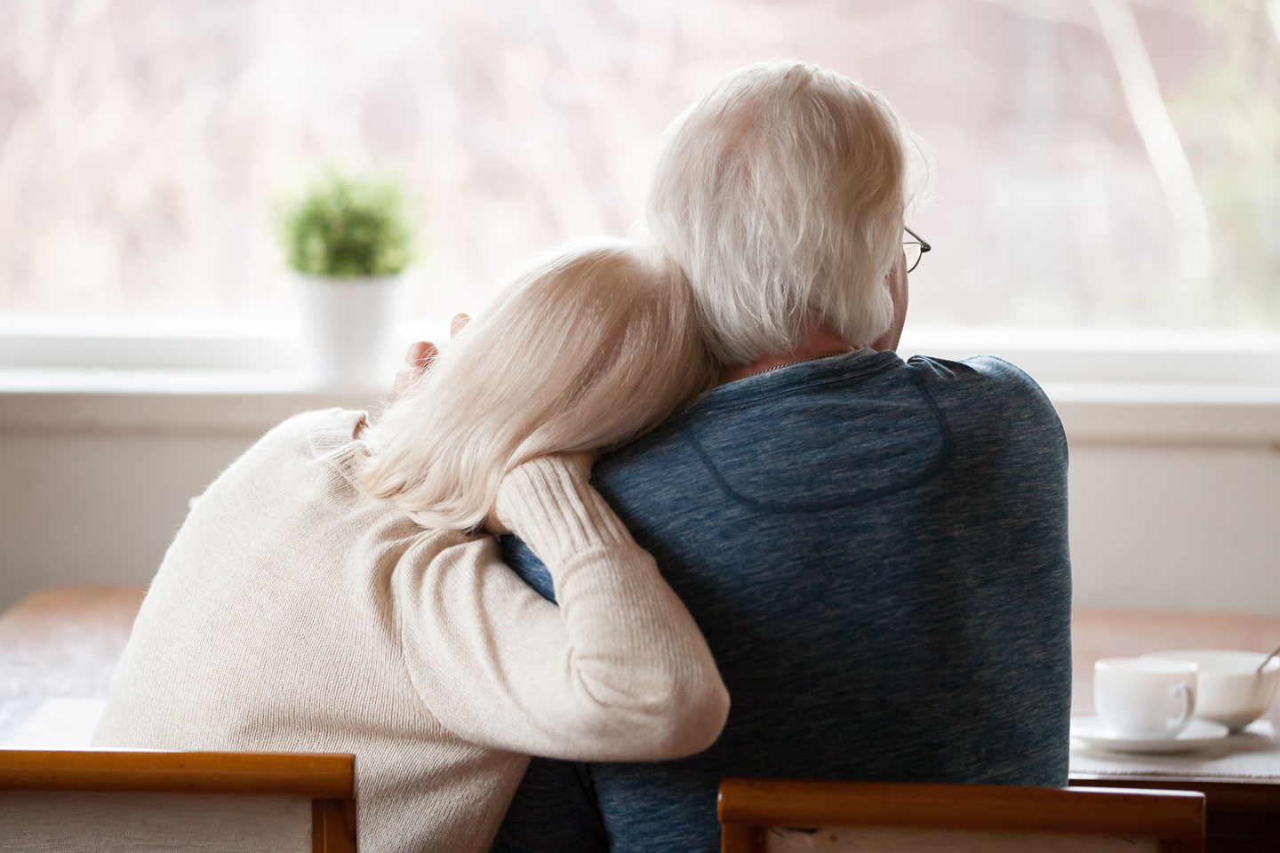 Senior couple at kitchen table 