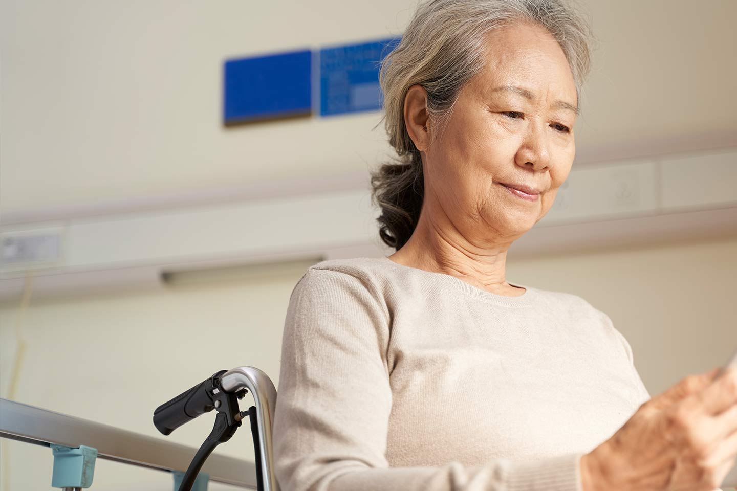 Photo of a woman sitting in a wheelchair