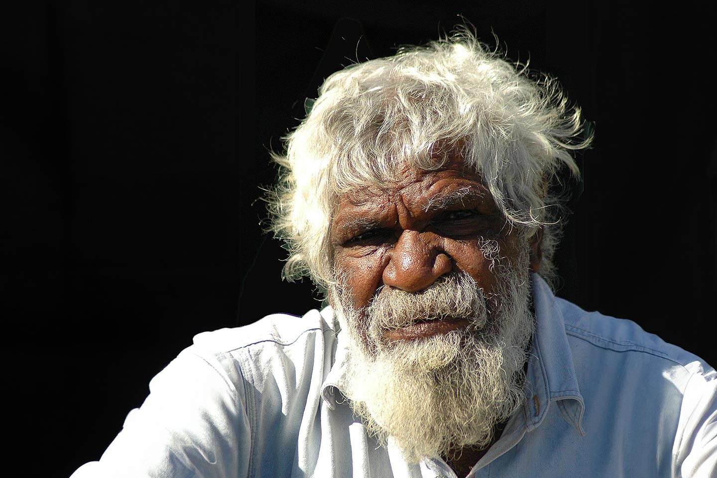 Photo of man with white hair and beard