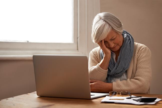 Photo of woman in front of her laptop