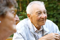 Image of an older man and his wife