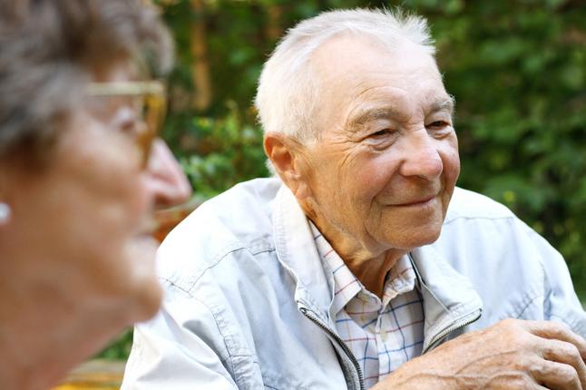 Image of an older man and his wife