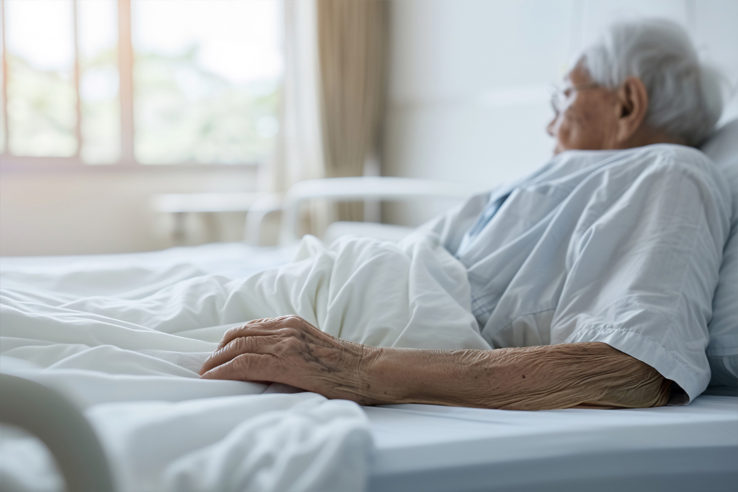 Photo of person in a hospital bed
