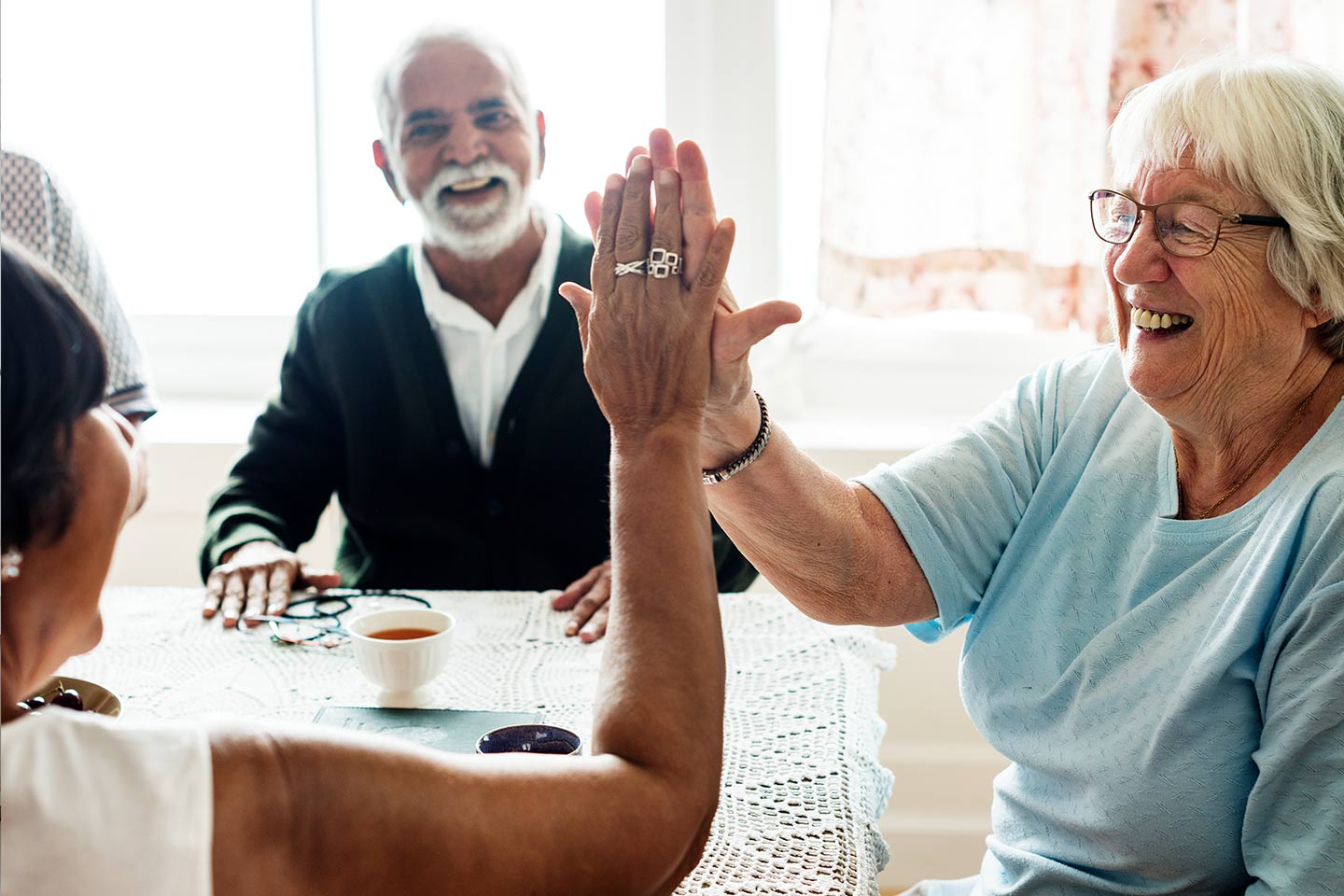 Photo of a happy group and a high five