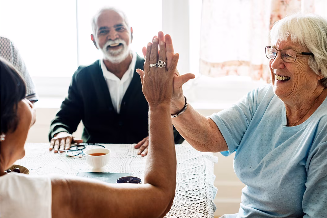 Photo of a happy group and a high five