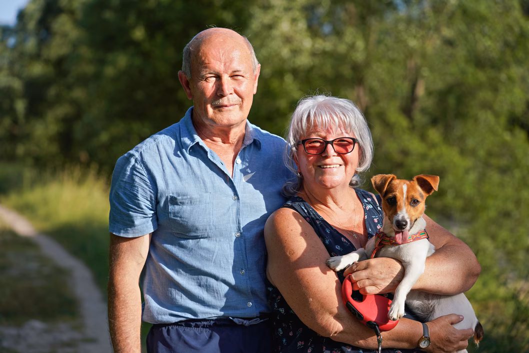 Middle aged couple and their dog