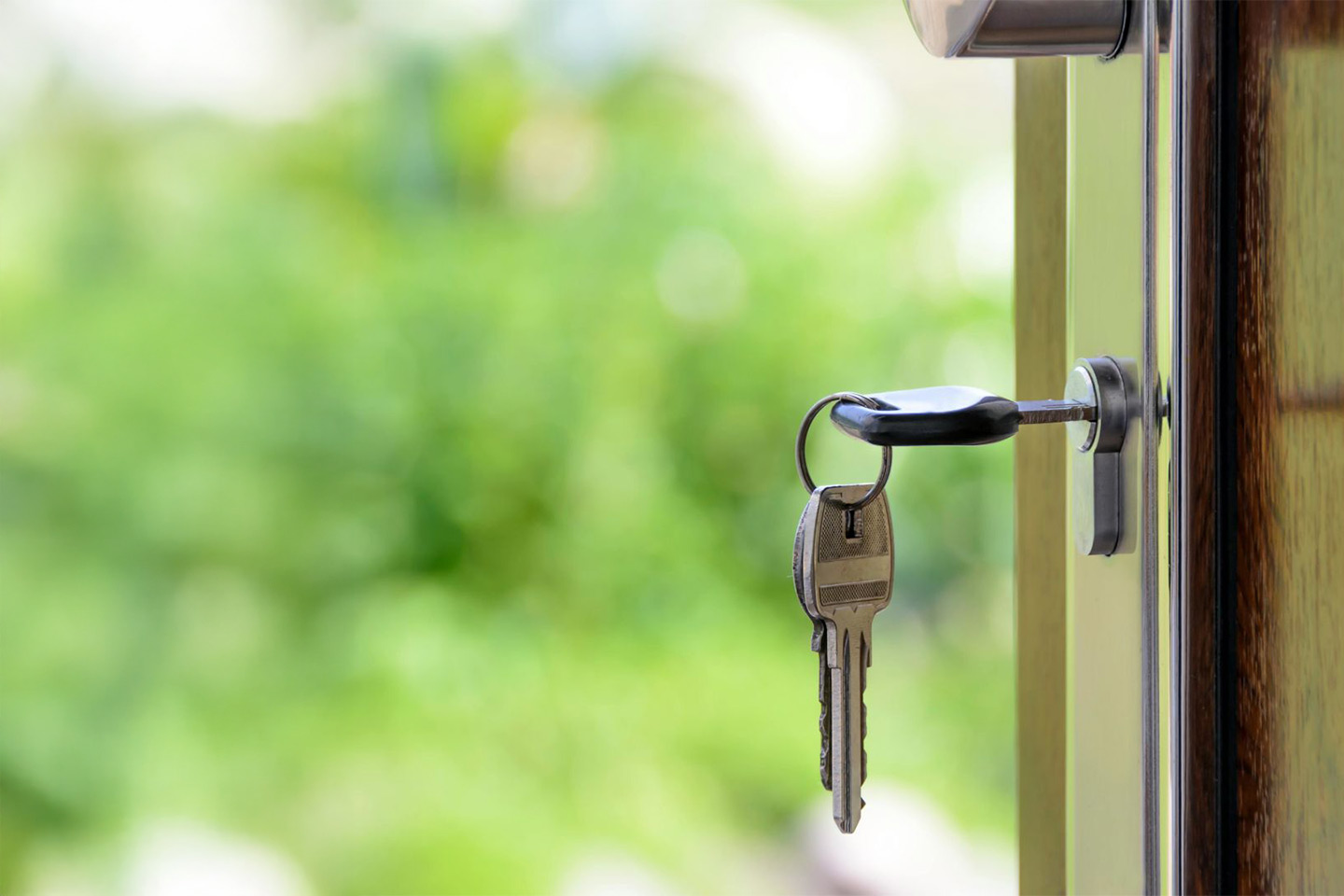 Photo of keys in a front door lock