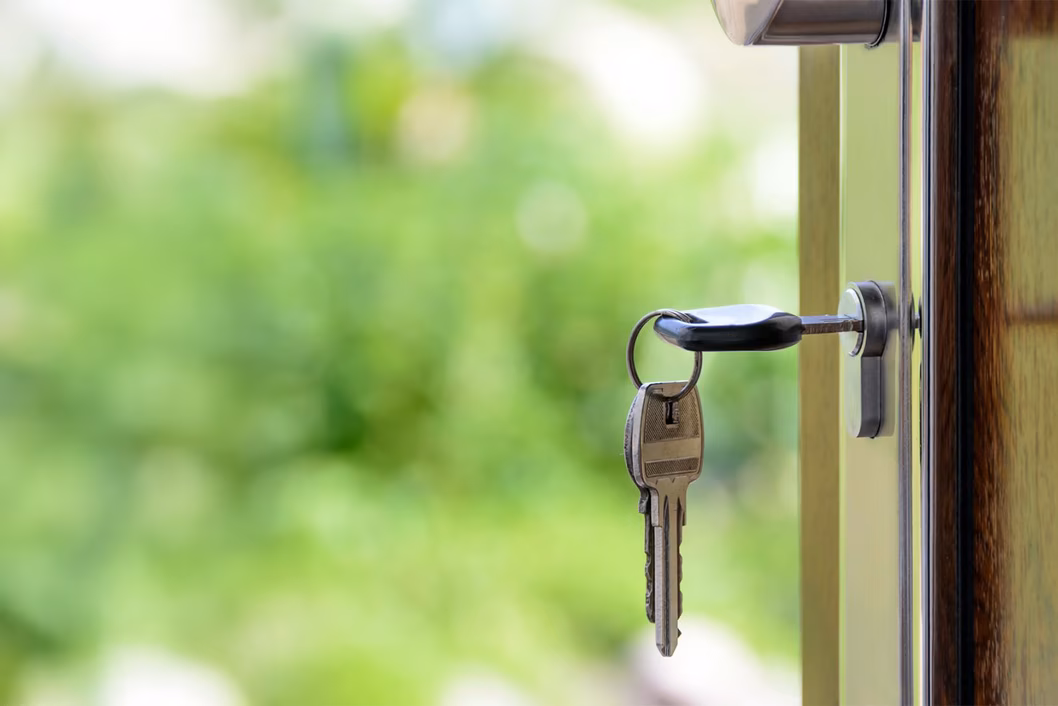 Photo of keys in a front door lock