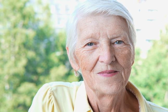Image of an older caucasian woman with short grey hair