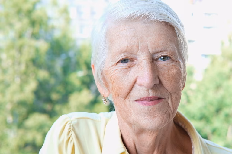 Image of an older caucasian woman with short grey hair