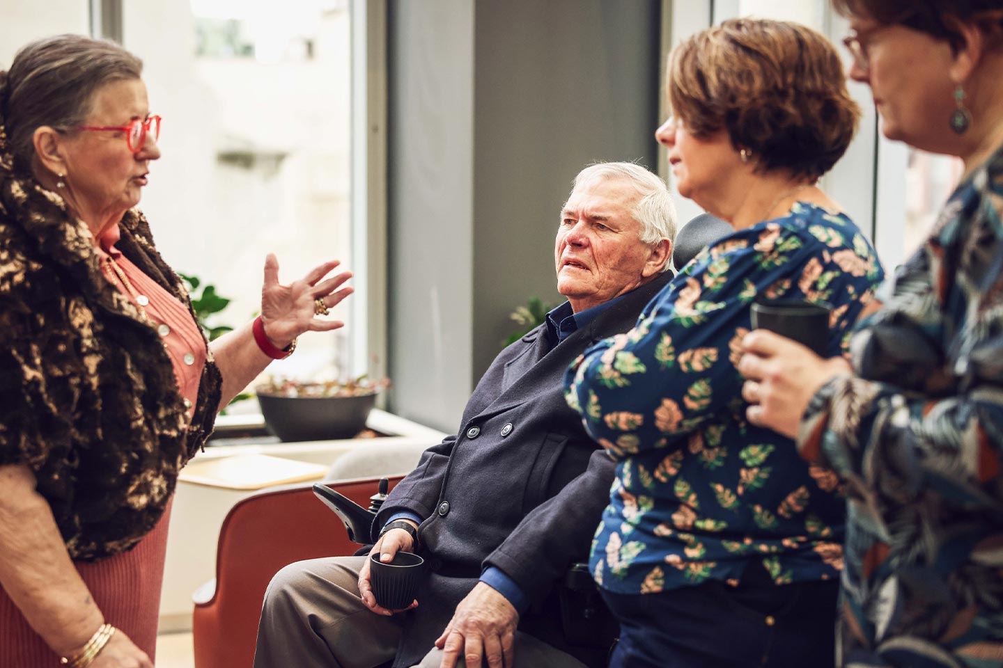 Photo of people chatting in a group